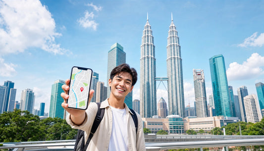 A traveler using a VOYA eSIM with the Petronas Twin Towers, Kuala Lumpur