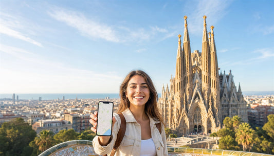 A traveler using a VOYA eSIM with the Sagrada Familia, Barcelona, Spain